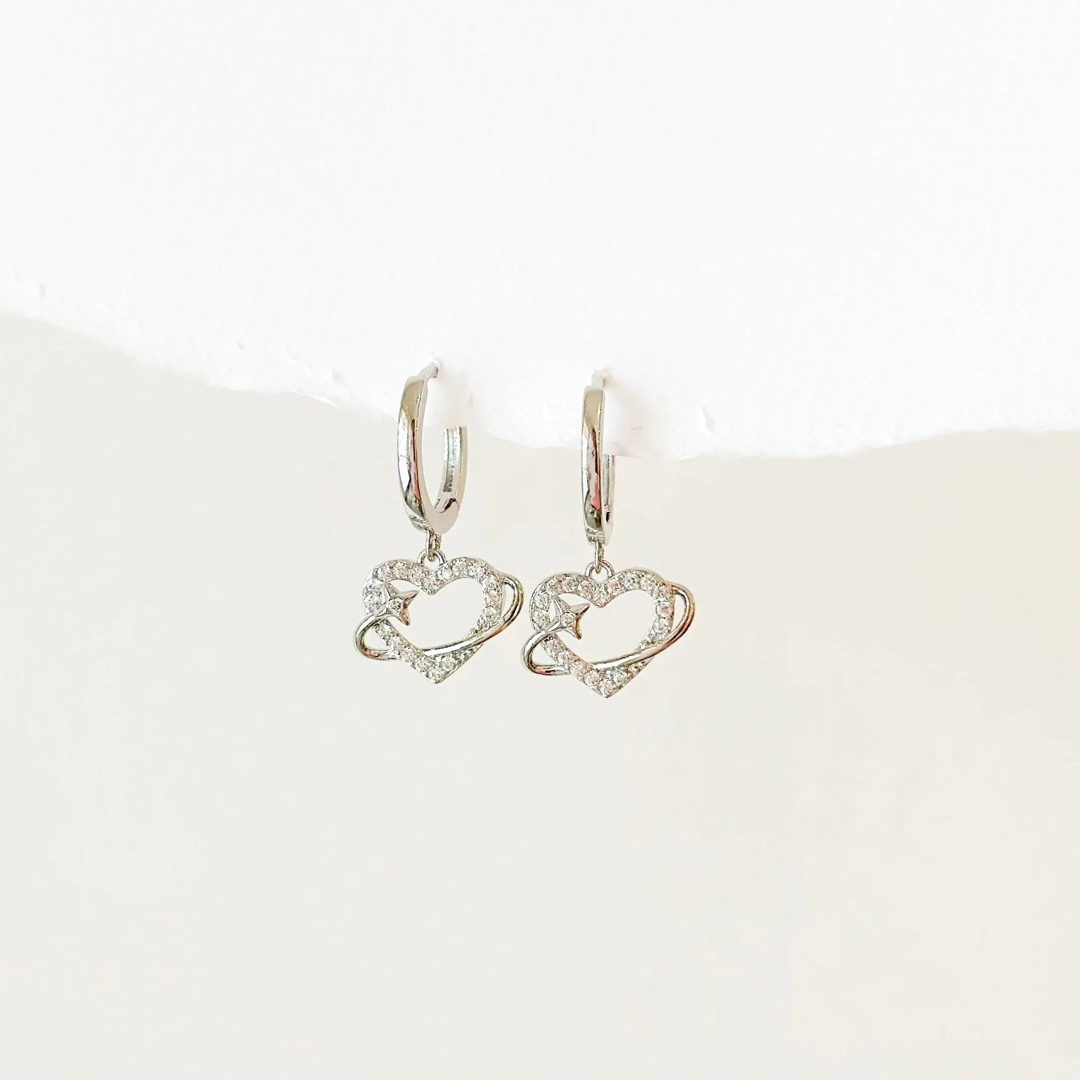 Cupid Huggie Hoop Earrings