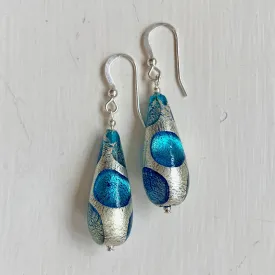 Earrings with shades of blue spots over white gold Murano glass long pear drops