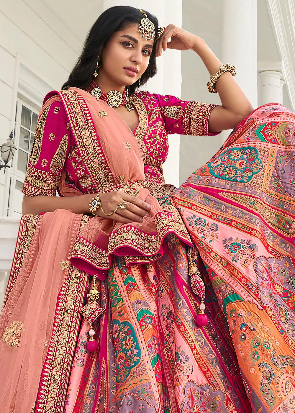 Multicolor Peach Heavy Embroidered Silk Bridal Lehenga Choli